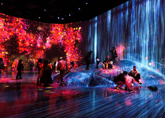 The interactive waterfall and petal formation of teamLab Borderless.