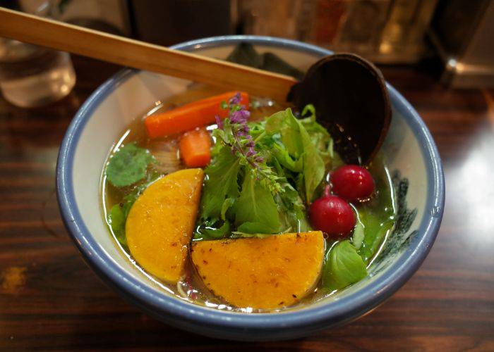 Afuri's Rainbow Vegan Ramen, filled with colorful veggies.