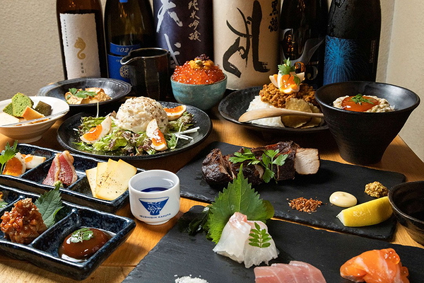 Japanese restaurant dishes with sushi, sashimi, and sake display