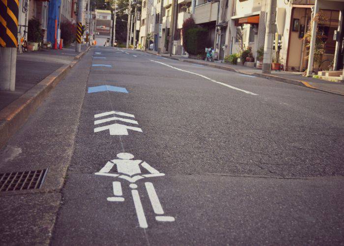 The painted road in Tokyo, representing a cycle path.