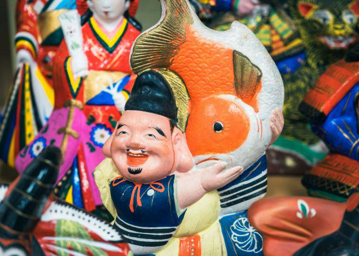 The cheerful and colorful god Ebisu, the bringer of luck and fortune for fishermen and commerce.