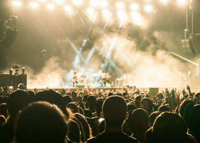 The main stage and excited crowd of Fuji Rock Festival, Japan.