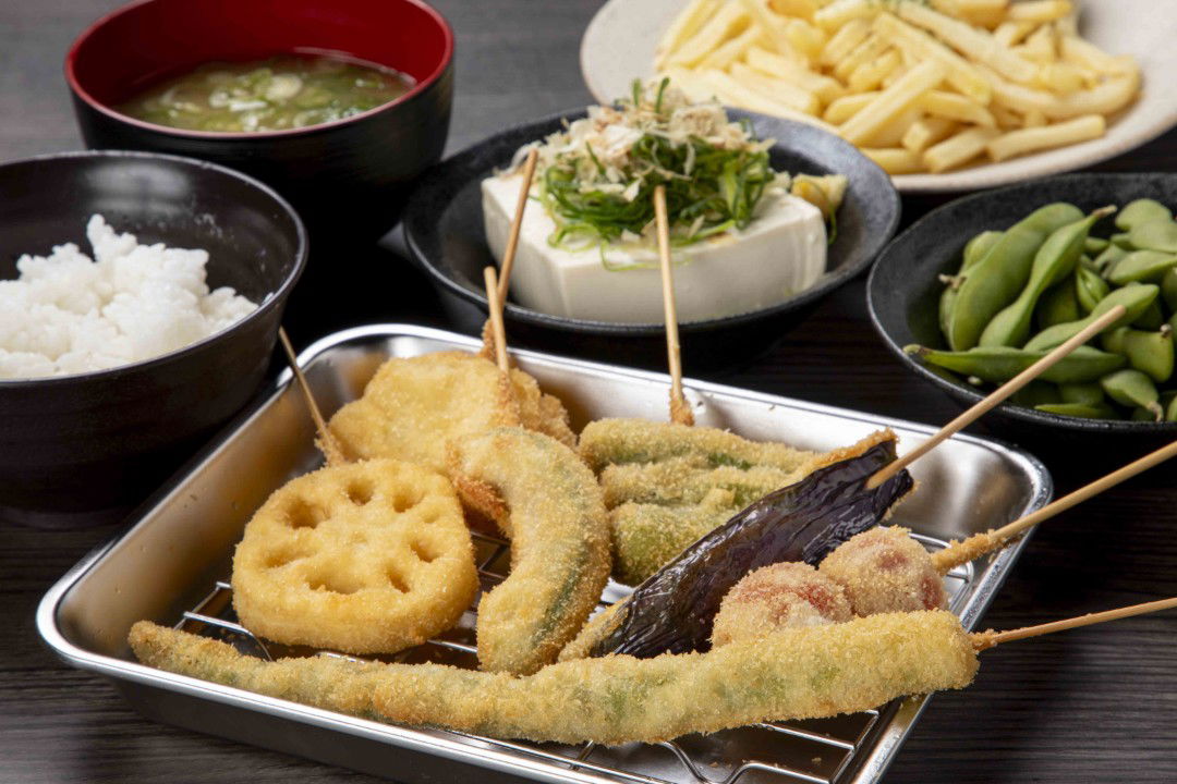 Assorted tempura skewers with rice and tofu