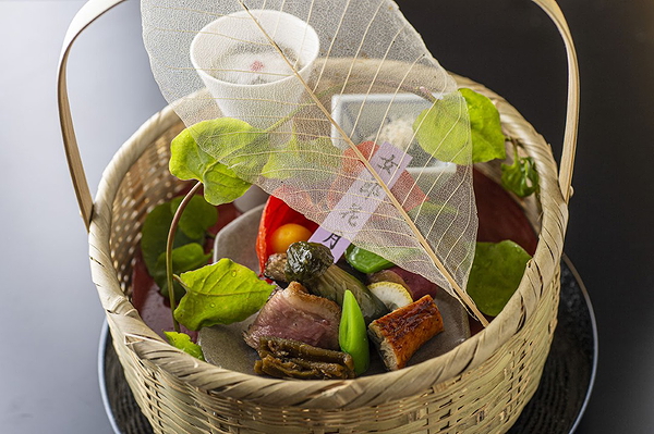 Elegant traditional Japanese cuisine in a bamboo basket