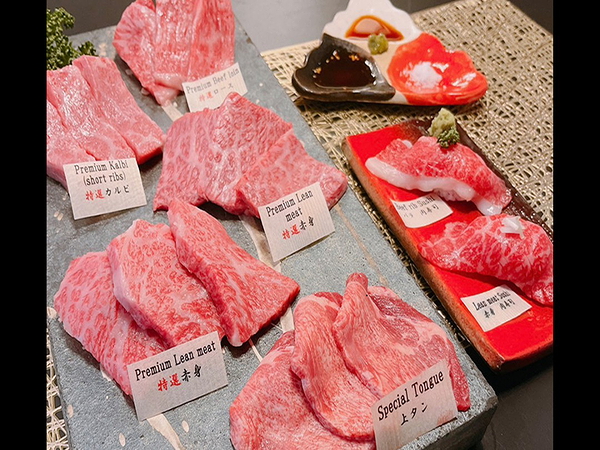 Assorted premium meats displayed for dining at a restaurant