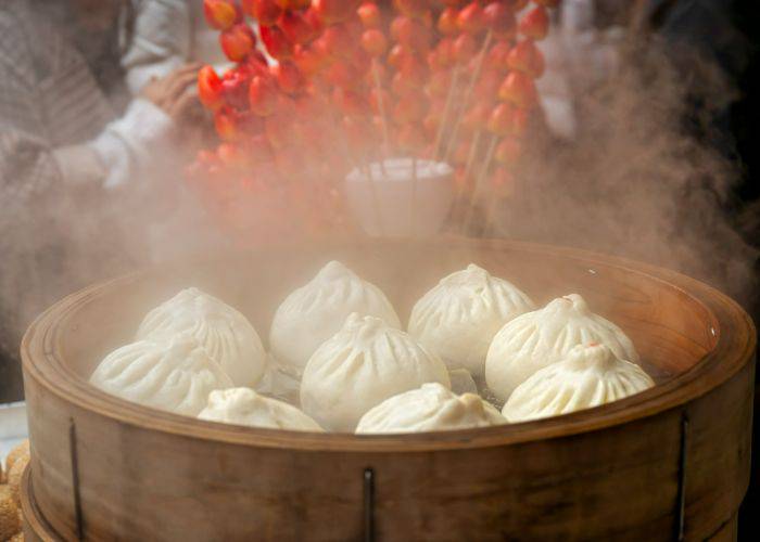 Gigantic steamed dumplings being made in Yokohama Chinatown.