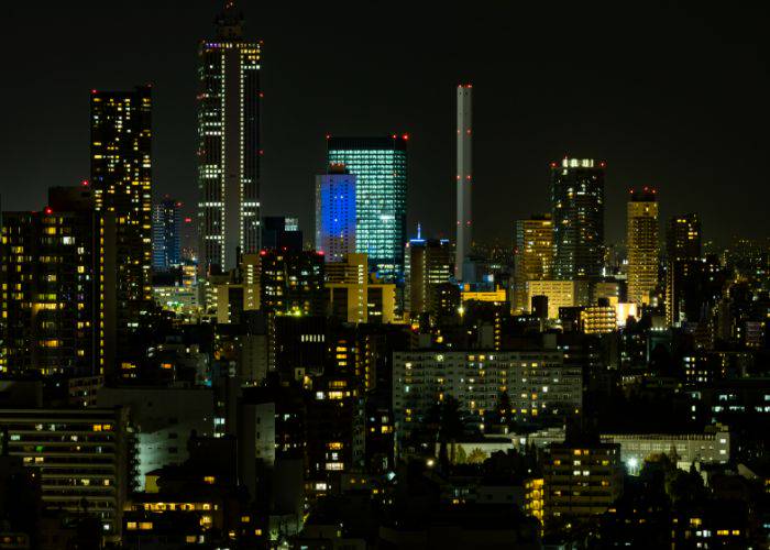 The skyline of Tokyo's Ikebukuro district at night.