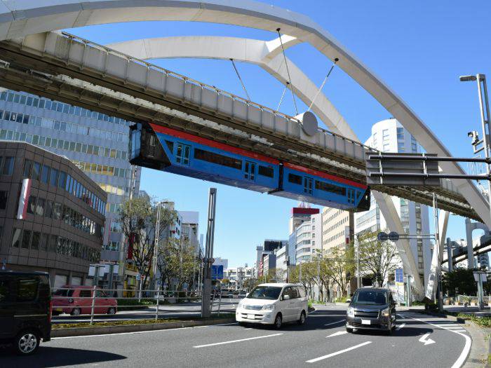 The eye-catching Chiba Urban Monorail, crossing above the road in Chiba.