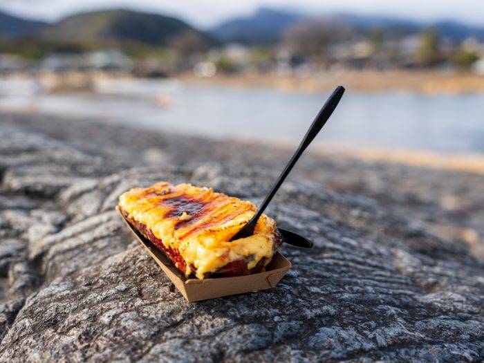 A baked sweet potato on the banks of Kyoto's Kamo River.