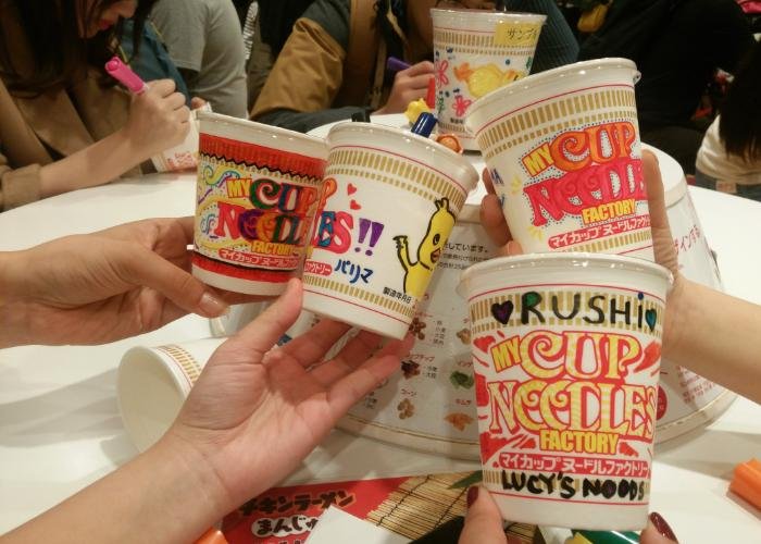 Various Cup Noodles during the decorating process at the Cup Noodle Museum