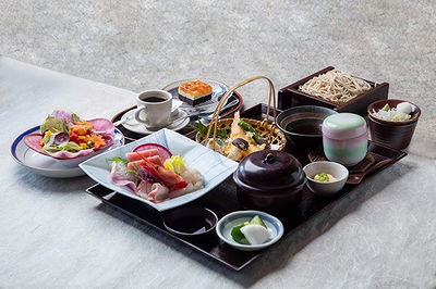 Traditional Japanese kaiseki meal with sushi and soba noodles