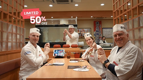 Chefs enjoying sushi-making class with 50% discount offer