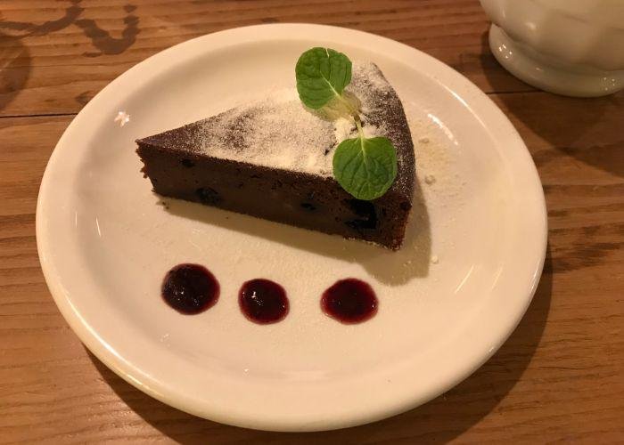 A slice of moist chocolate cake froma vegan-friendly cafe in Kobe