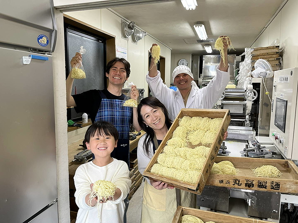 Family enjoys making fresh ramen noodles together
