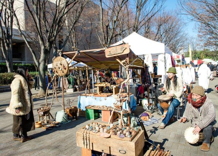 earth garden festival stall selling wooden crafts