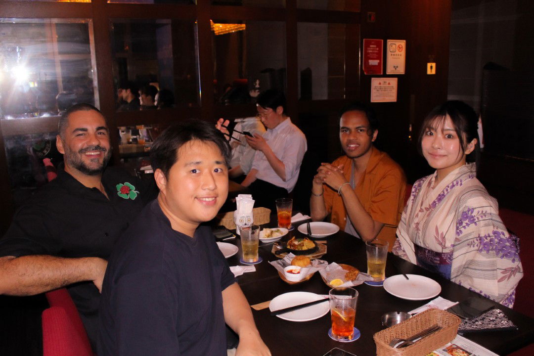 Group dining experience in an Asian restaurant with diverse cuisine