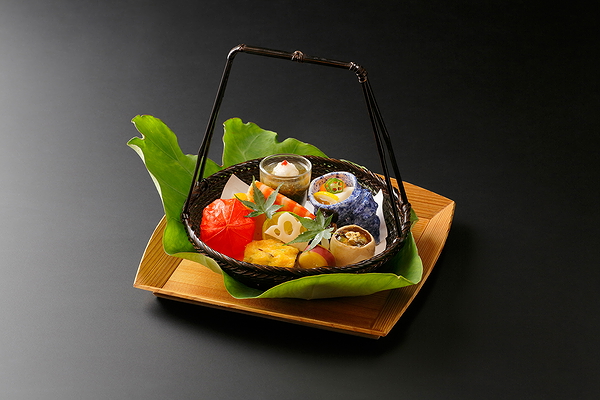 Elegant Japanese dish in woven basket with artistic presentation
