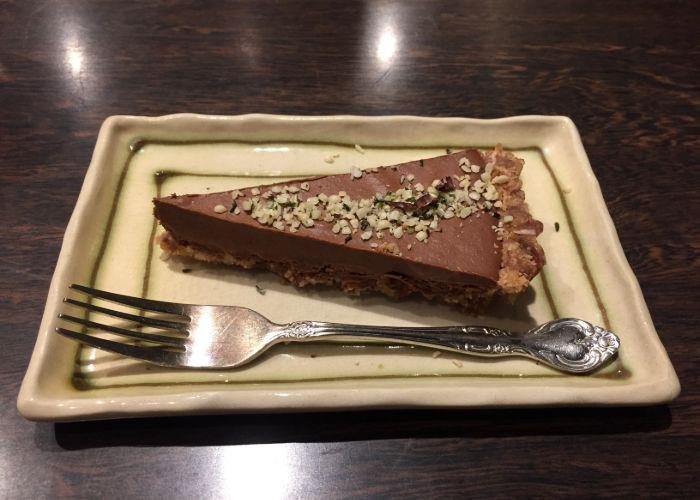 Piece of chocolate cake from Kissa Saeki, a vegan-friendly cafe in Hiroshima,