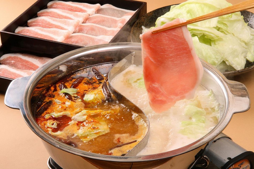 Authentic Japanese hot pot with fresh meats and vegetables