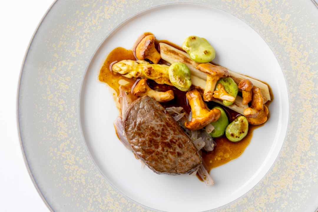 Gourmet beef entree with fava beans and chanterelles