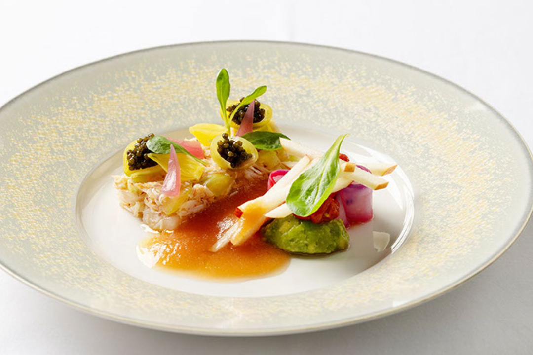 Gourmet seafood dish with caviar and avocado puree