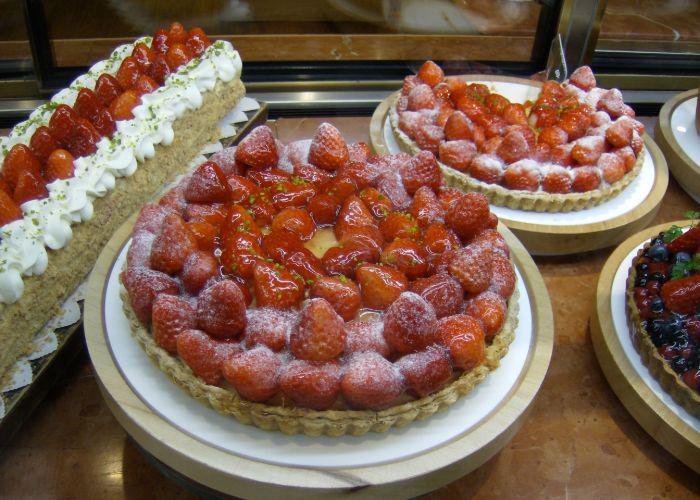 Strawberry decorated cake with cream