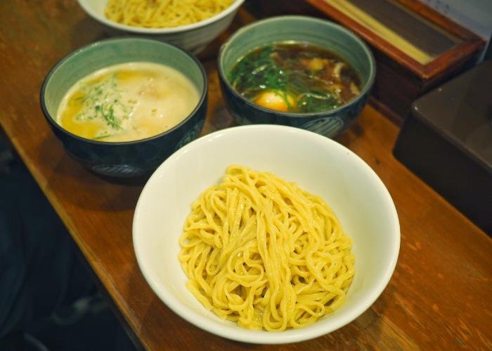 Bowl of tsukemen ramen with thick curly noodles from Kogaryu Seimen, a ramen shop in Kobe 
