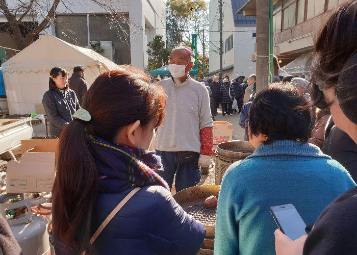 Man selling sweet potatoes, satsumaimo