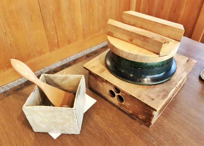 Earthen clay pot for cooking rice at Komago restaurant