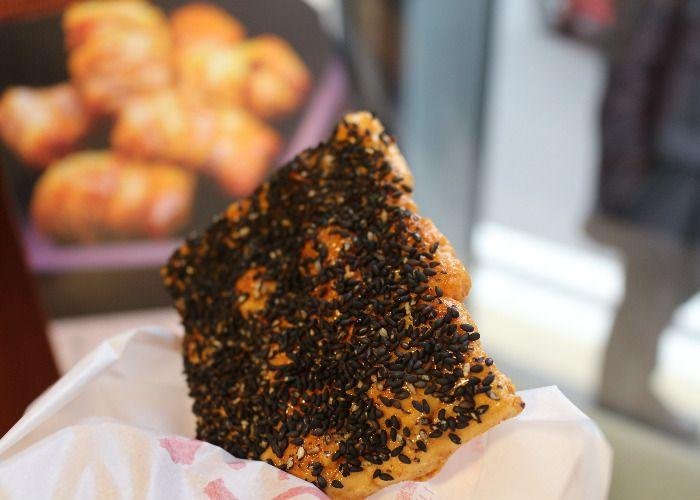 Senbei rice cracker covered with black sesame
