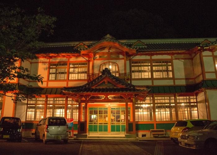 Facade of Takeo Onsen at night