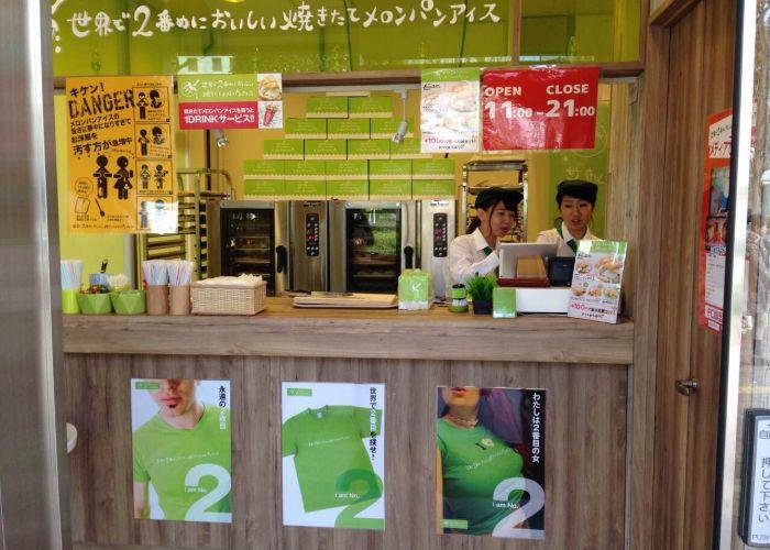 In the storefront of Melon Pan Ice, two employees are getting ready to serve customers.
