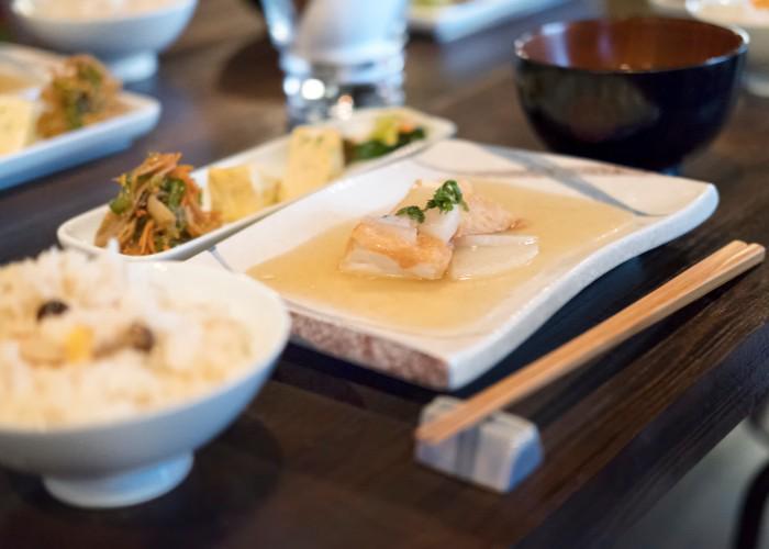 Obanzai, Kyoto home cooking dishes, a balanced meal layout with one soup bowl, rice bowl in the foreground, main plate, and other veggies