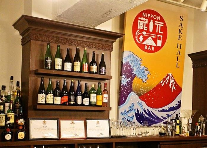 Wall of sake at SAKE HALL HIBIYA BAR, a nihonshu bar in Tokyo