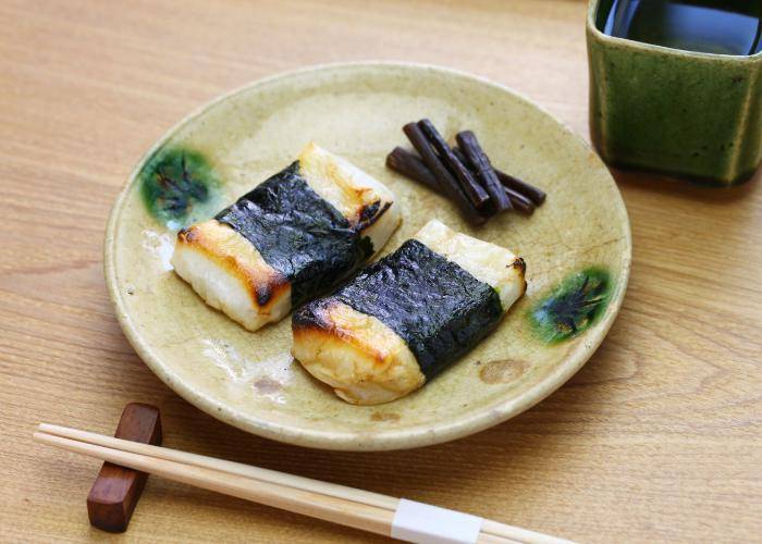 Isobe Maki Mochi, wrapped in nori and drizzled with soy sauce