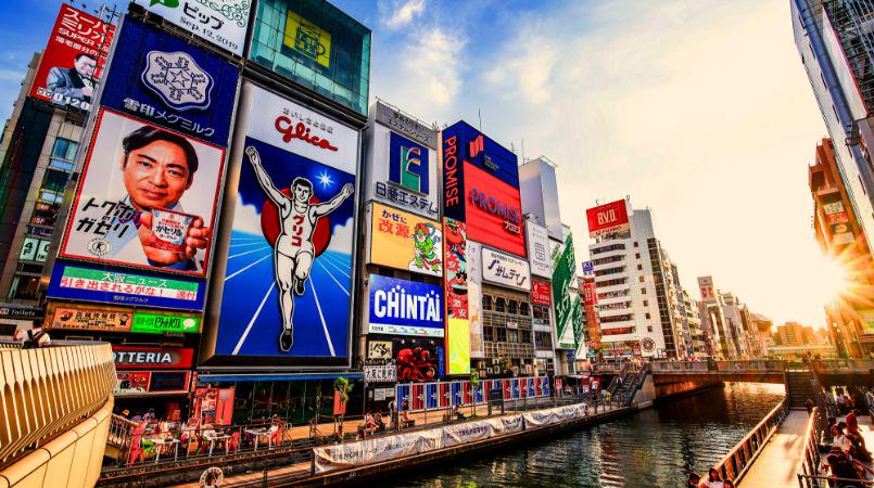 The memorable scenes of Dotonbori, the Glico man and the river.