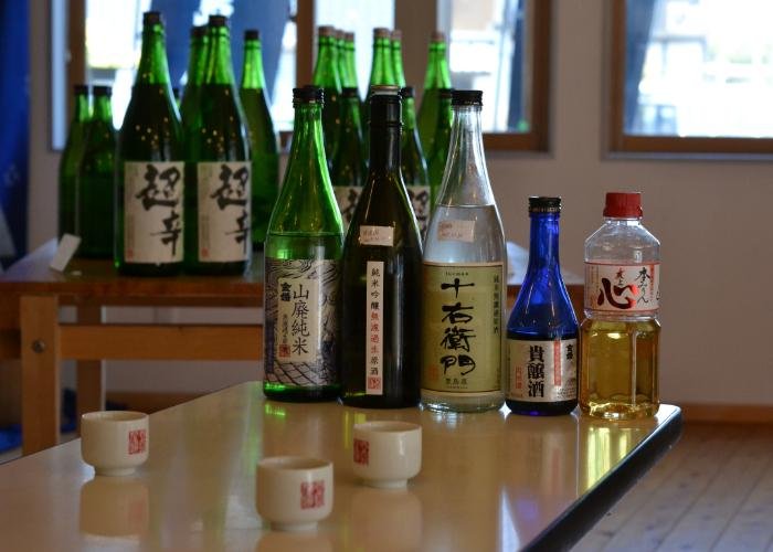 Toshimaya Shuzo sake bottles lined up