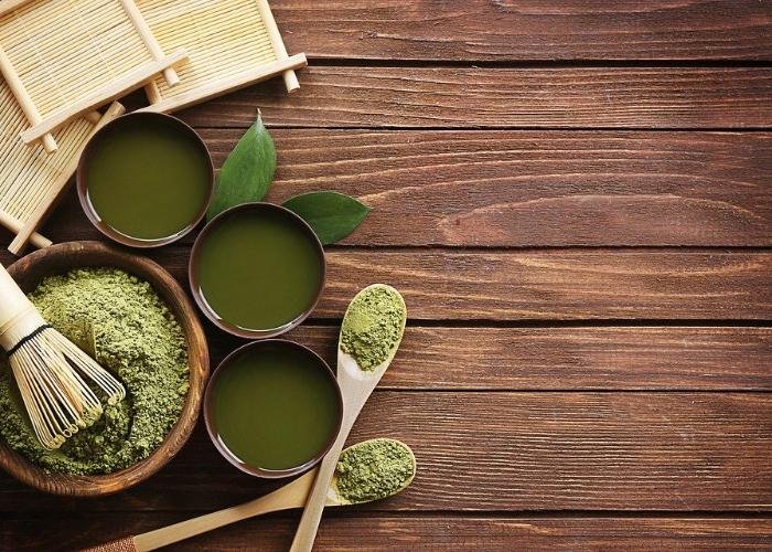 A popular Japanese drink, matcha green tea on a backdrop of wood