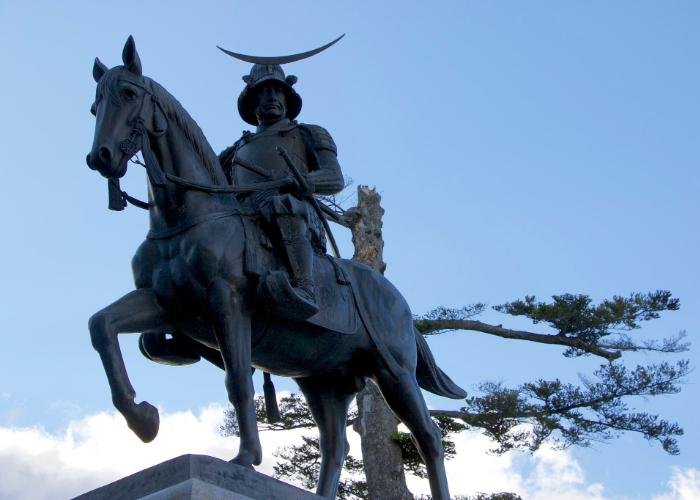 The statue of Date Masamune on a horse, which stands outside the castle.