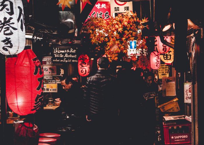 Shinjuku after dark with lanterns glowing