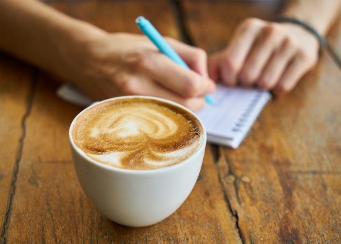 Beautifully swirled latte, cup of coffee