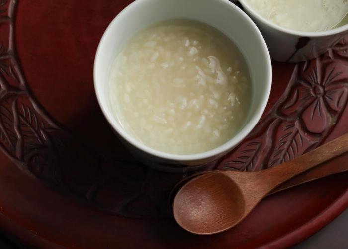 A cup of Japanese amazake, a sweet wintertime sake drink made from fermented rice