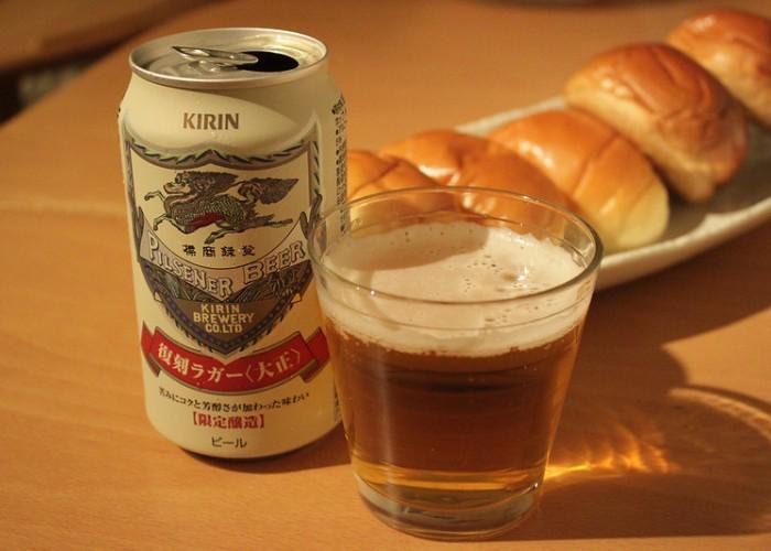 Can of Kirin Beer Pilsner with a side of rolls