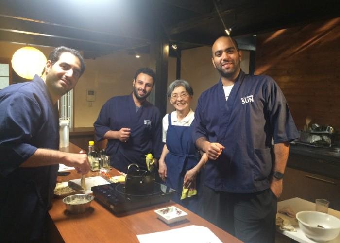 Three men and their Japanese cooking teacher during the Bento Making Class in Kyoto