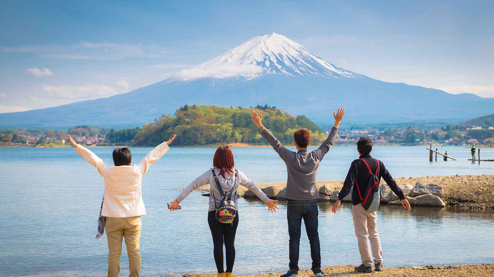 People enjoying scenic view of Mount Fuji in Japan