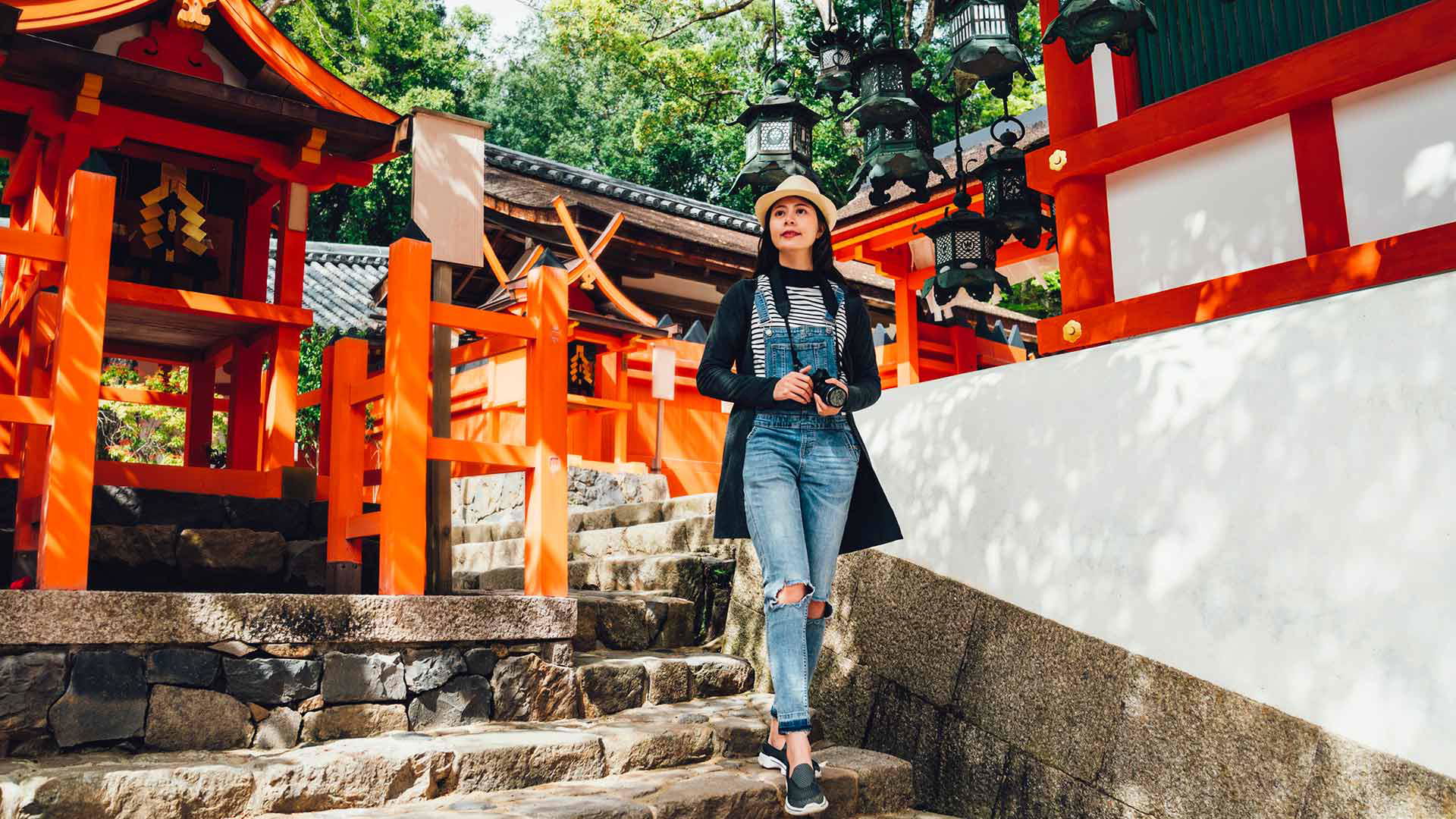 Traveler exploring scenic Japanese temple steps