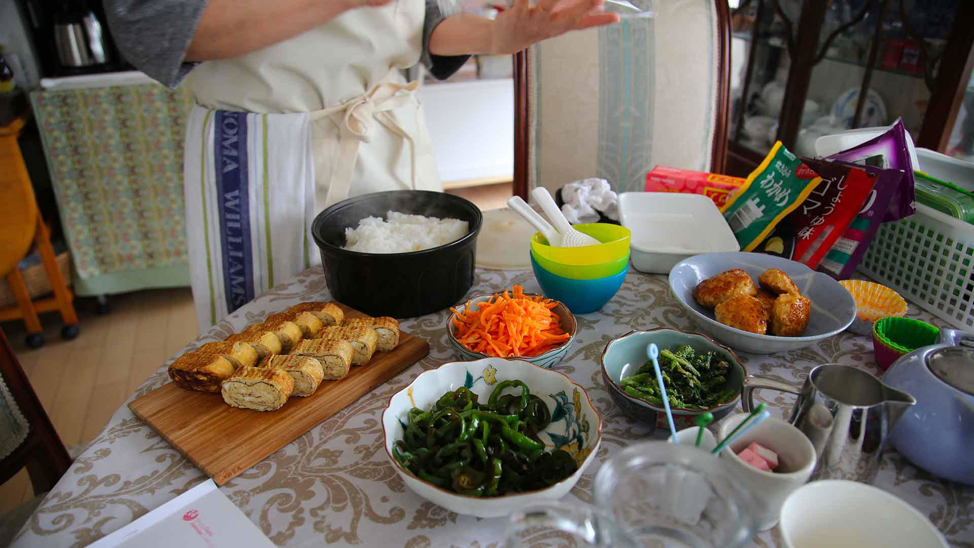 Japanese home-cooked meal with rice and vegetable dishes